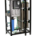 Industrial water filtration system with stainless steel tanks, control panel, and blue filter in a black metal frame.